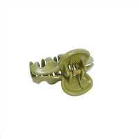 Green plastic hair clip with curved jaw and teeth