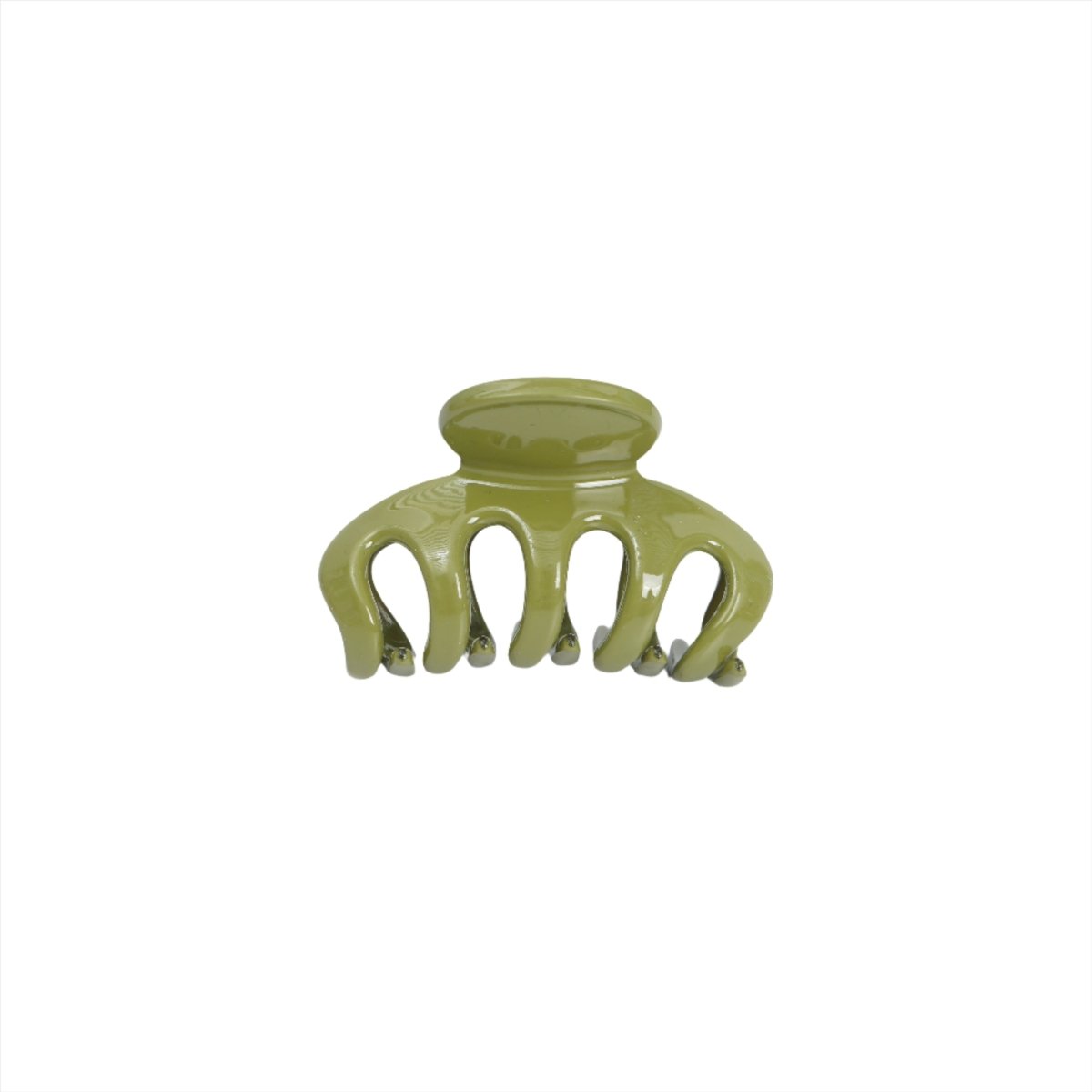 Green plastic hair clip with curved design and multiple teeth