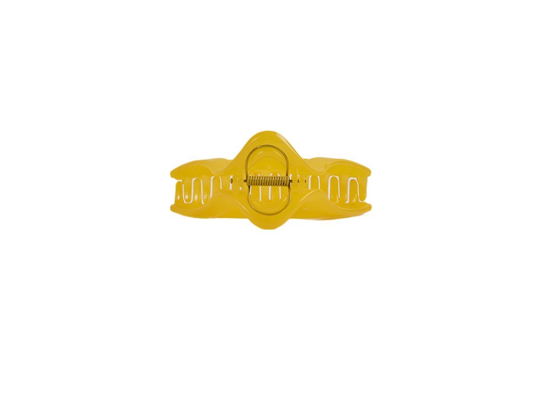 Yellow triangle plastic hair clip with comb teeth and round hinge detail