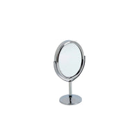 Makeup mirror with tilted circular frame on chrome pedestal base