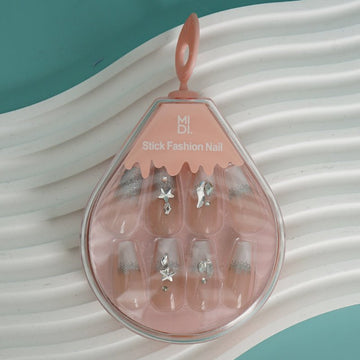 Stick-on nail set with nude base and silver star rhinestones