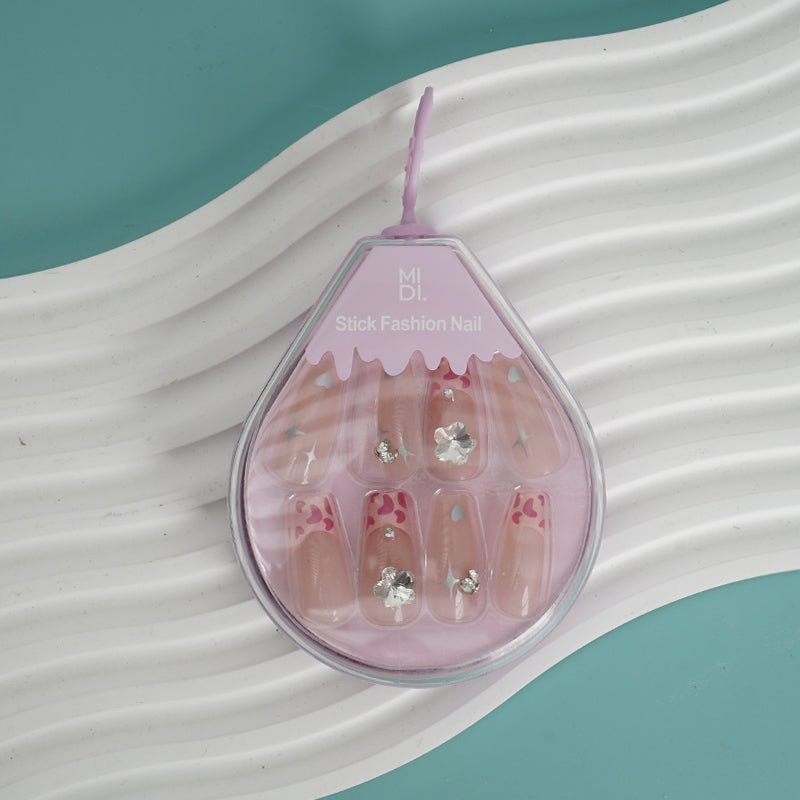 Stick-on fashion nails set on blister card: pink hearts with rhinestone accents
