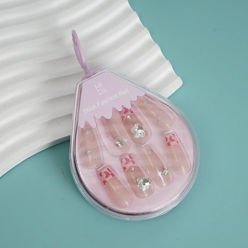 Stick-on fashion nails set blister: clear-pink tips with heart prints and gem details