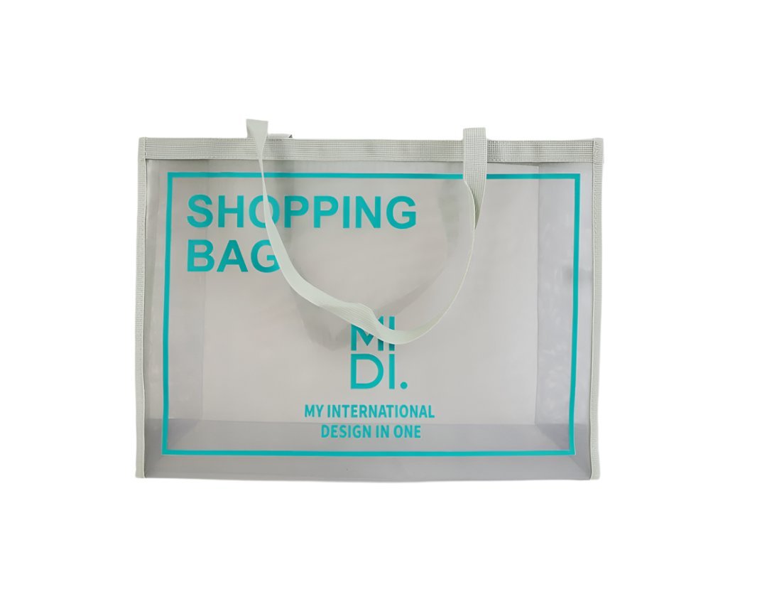 Transparent shopping bag with teal trim, handles, and printed SHOPPING BAG logo