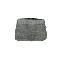 Grey travel bag back view with rounded shape and stitched seam lines