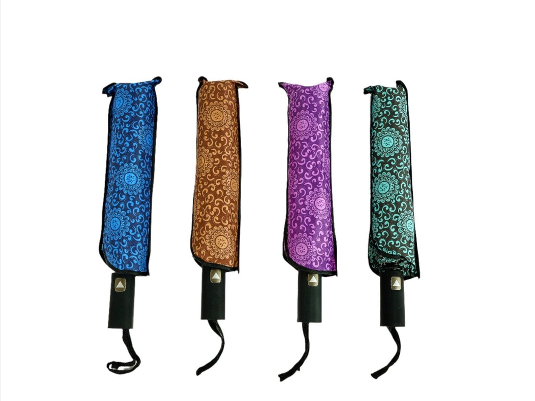 Patterned umbrella canopies in blue, brown, purple, and green with black strap handles