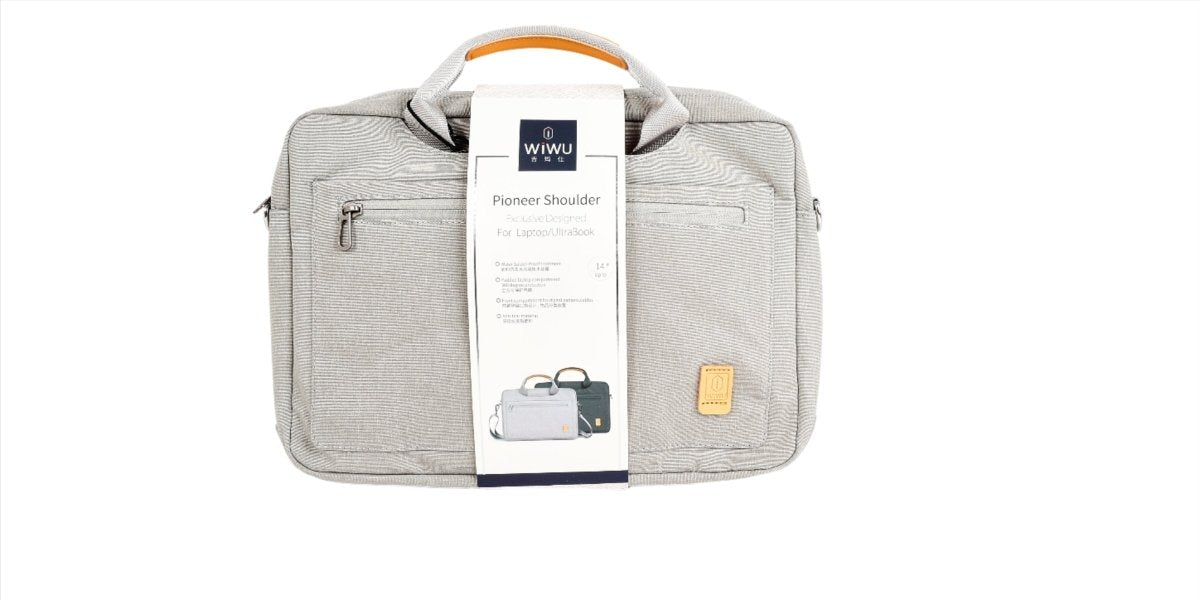 Light gray laptop bag with included product tag card clipped to the front zip pocket