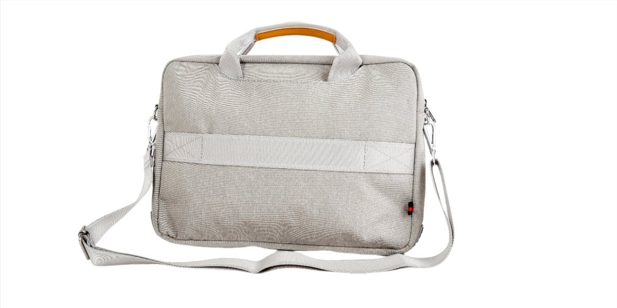 Light gray laptop bag side profile with adjustable strap and stitched seam panel