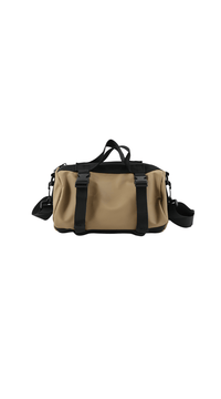 Waterproof shoulder bag in tan with black straps and front zip pocket