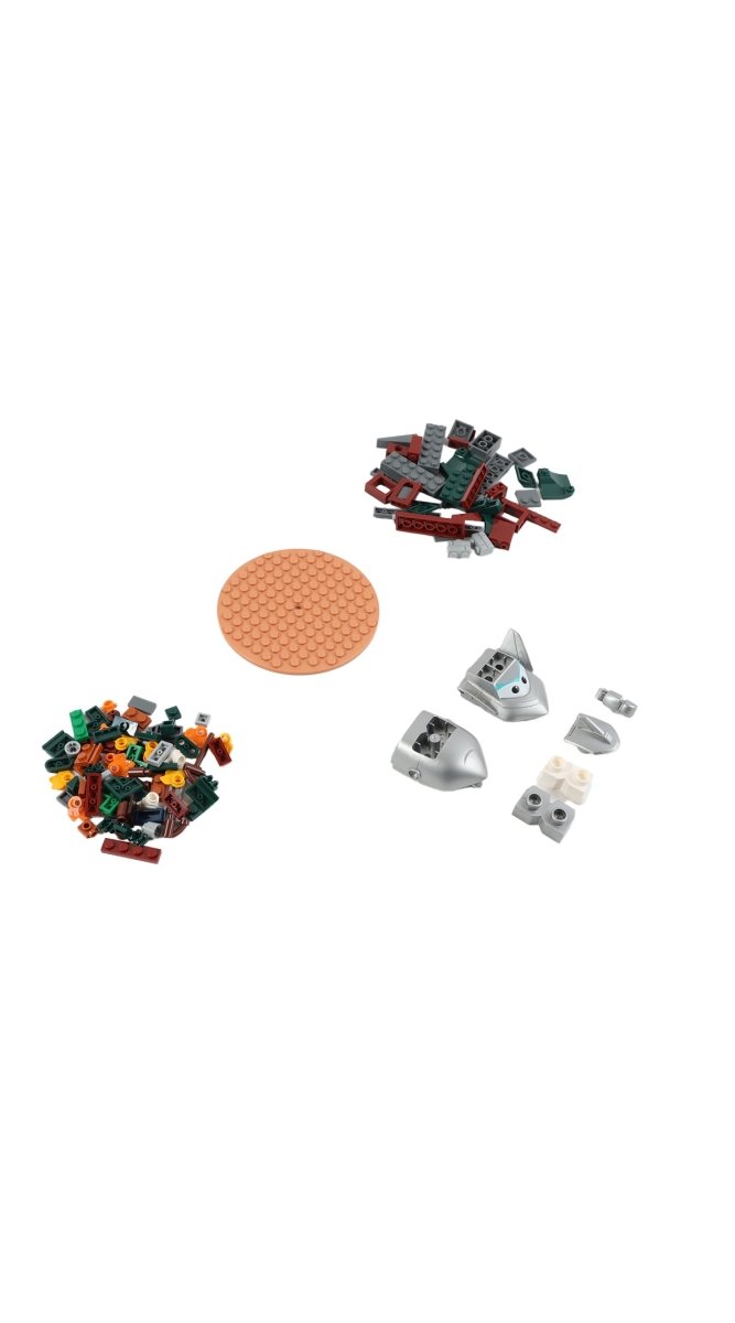 Building ball parts: orange base plate, red/gray brick pieces, and white connector parts