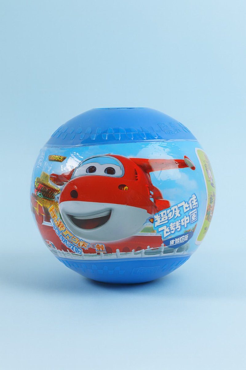 Blue Super Wings building ball with red plane and smiling face graphic on front