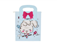 Light blue gift bag with cute cotton candy sheep face and pink bow handle