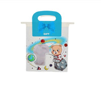 White gift bag with cartoon bear astronaut design and blue bow-shaped handle