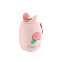 Pink plush cup toy side view with peach icon and embroidered “Sweet” text