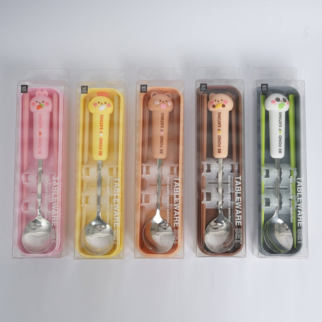 Animal-themed cutlery set storage cases in pastel pink, yellow, light beige, caramel, and light green