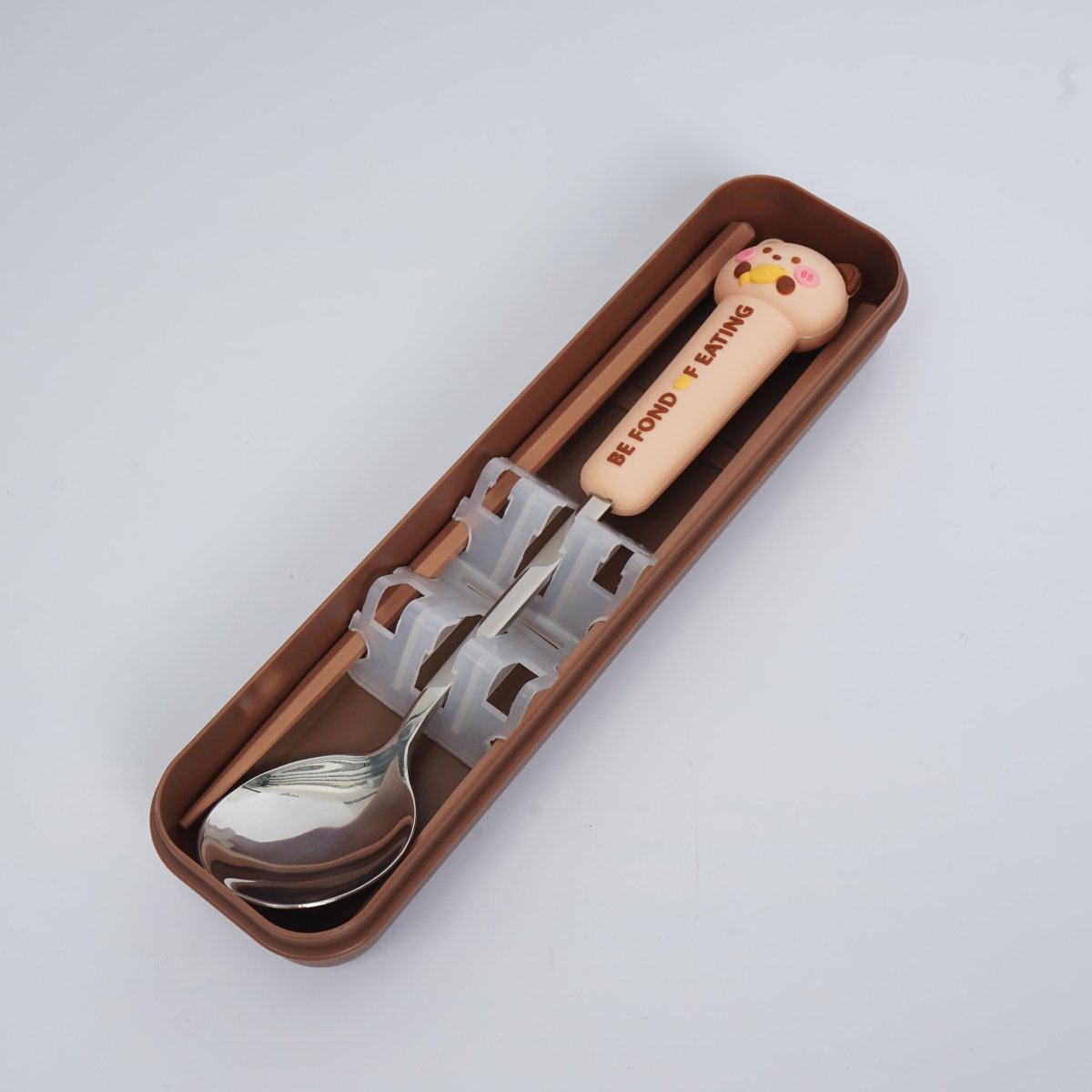 Brown storage case with animal-themed spoon and chopsticks set