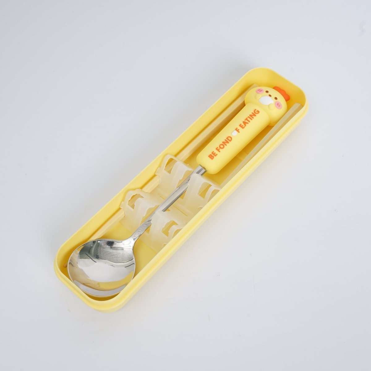 Yellow storage case with animal-themed spoon and chopsticks set
