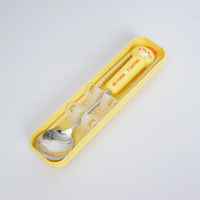 Yellow storage case with animal-themed spoon and chopsticks set