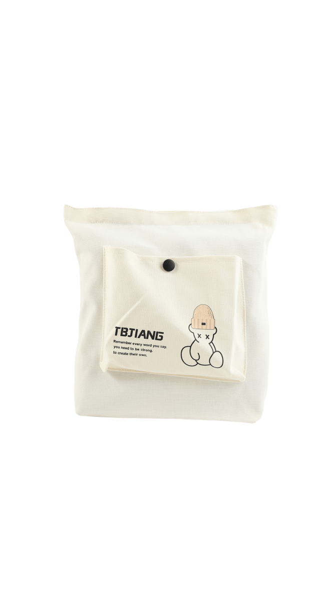 Cream canvas tote bag with bear patch label on front pocket