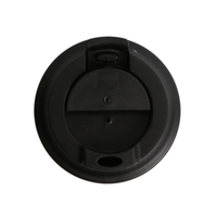 Thermos cup lid underside with central mechanism and vent opening
