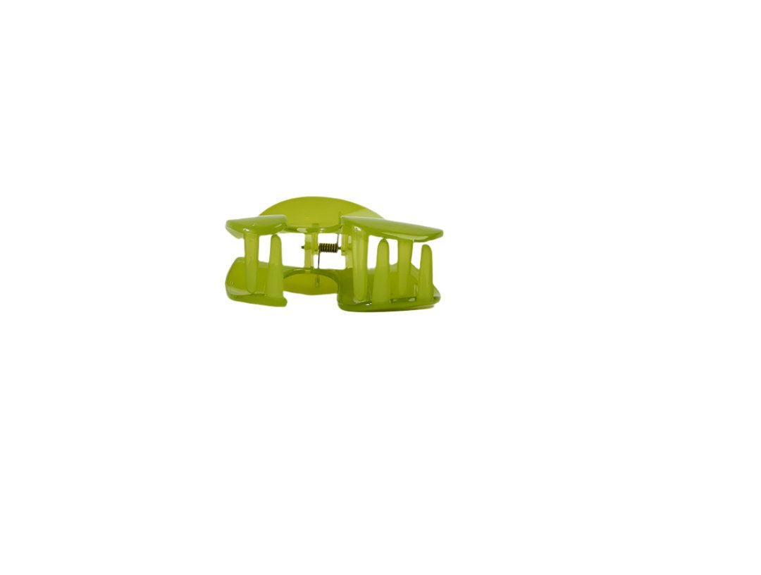 Green plastic hair clip, side view with interlocking prongs