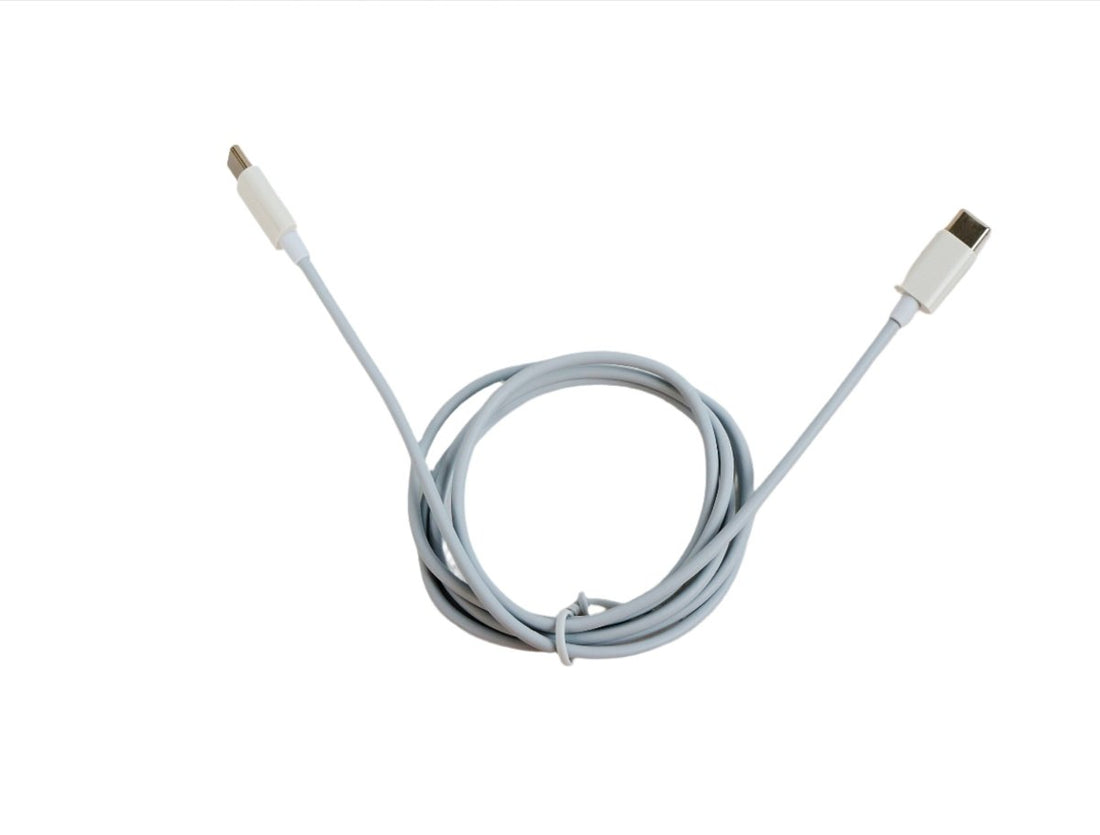 USB-C to USB-C cable with two USB-C ends on a coiled light gray cord, 1.2m