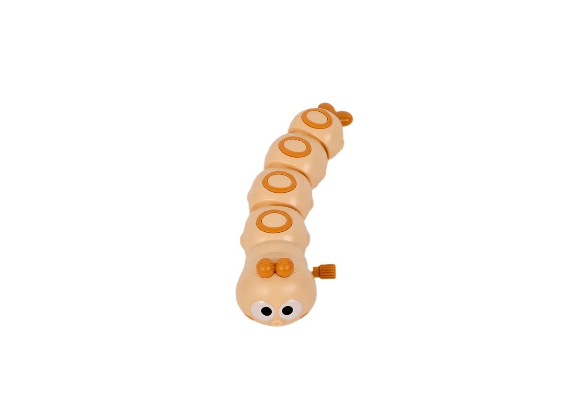 Winding caterpillar toy, beige with curled form, feet, and circular belly ridges