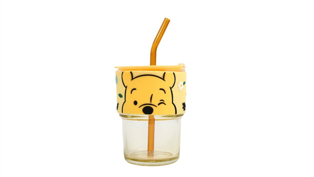 Winnie the Pooh glass cup with straw, clear cup with yellow character sleeve