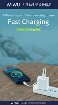 USB-C to Lightning charging cable powering a smartphone from a charger