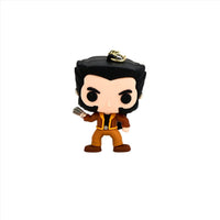 X-Men PVC keychain figure with black hair and brown boots, standing with keyring