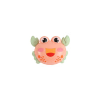 Educational crawling crab toy, peach with green ears and smiling face