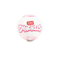 Snackles capsule toy ball with ZURU SNACKLES logo, pink and white