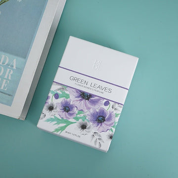 Floral women's perfume gift box with purple flowers and green leaf print